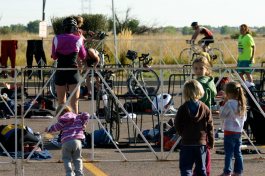 That is my youngest daughter trying to sneak into the transition area as I trasition from the swim to the bike.